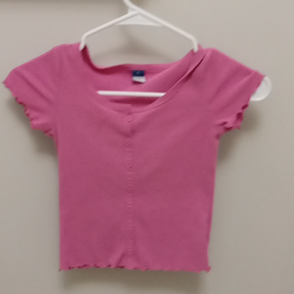 Light pink short sleeve shirt.